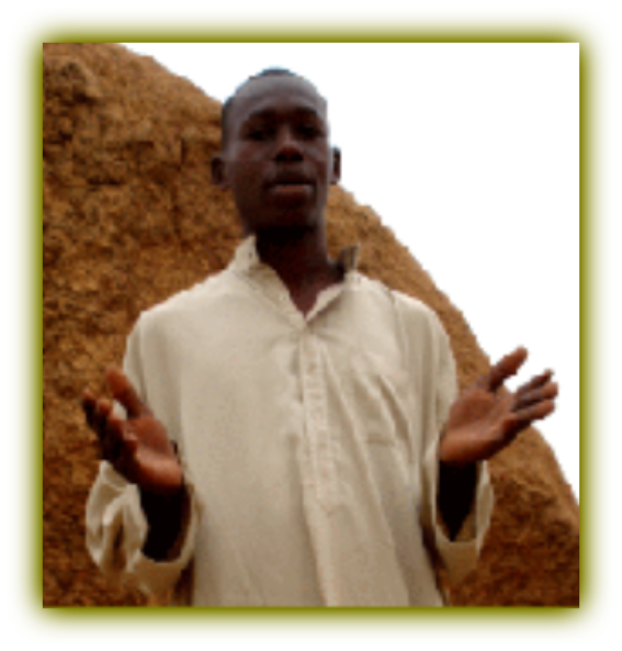 Priest with hands open in traditional pre-Islamic wear