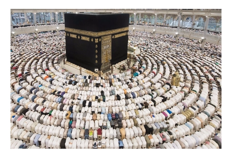 Devotees in prayer at Mecca.