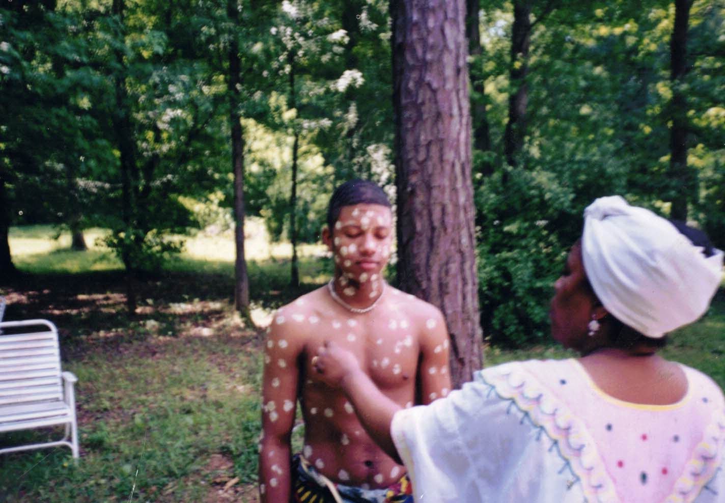 Mama Zogbe with client. 