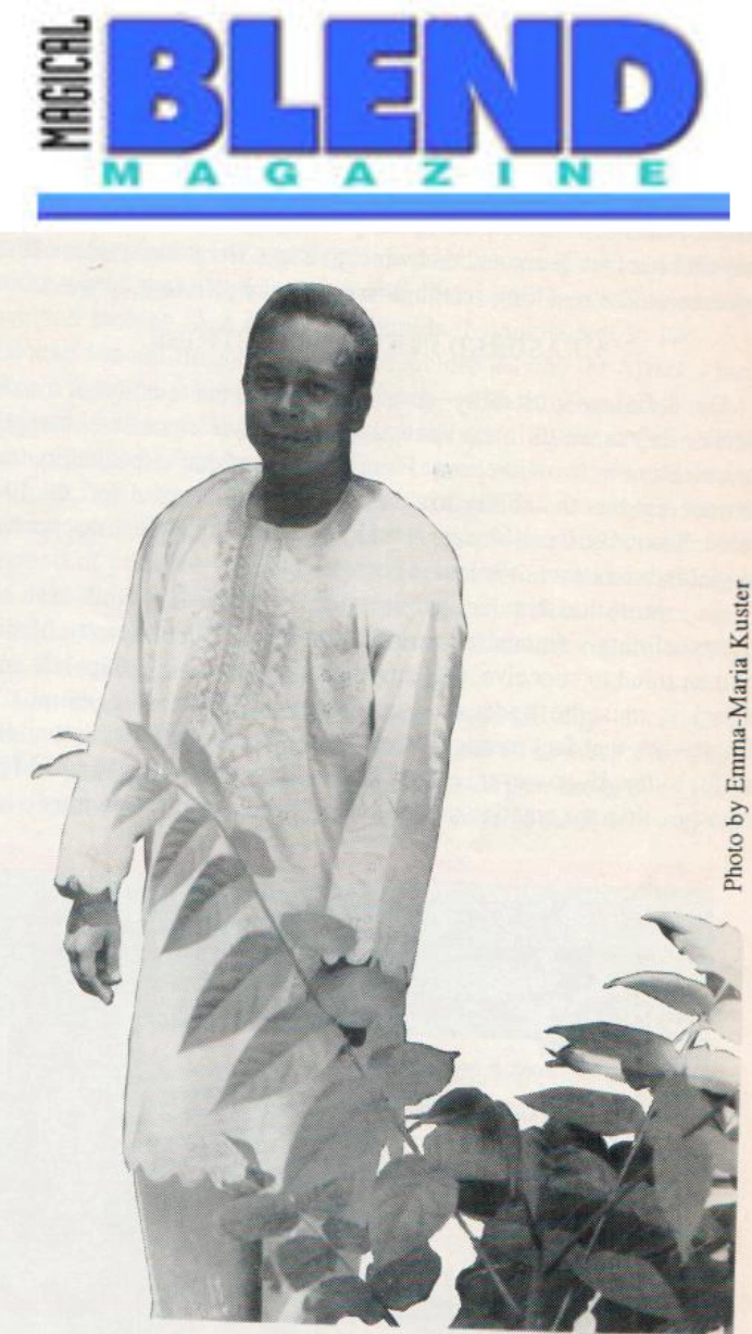 Photo of Papa Mou Mou Akuete Durchbach, Smiling under 1990s era Magical Blend Magazine Logo.
